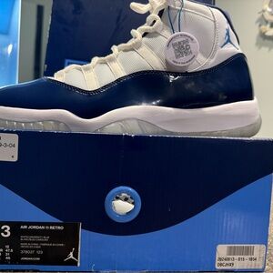Jordan 11 Retro White and Navy Sneakers